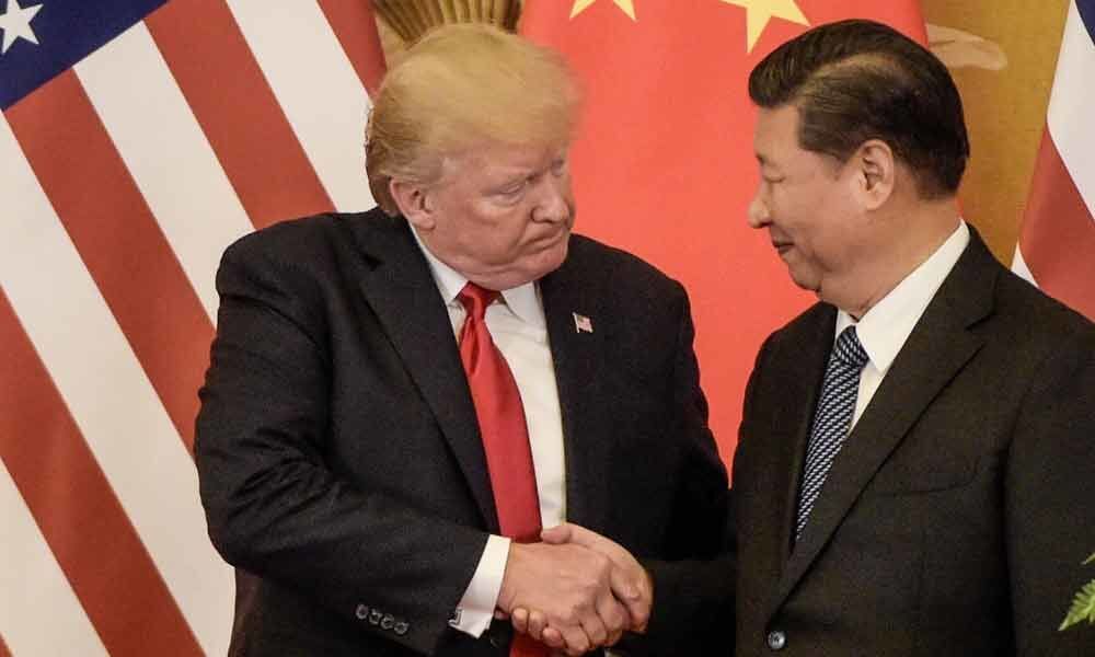 New US tariffs hit China, Beijing too imposes duties