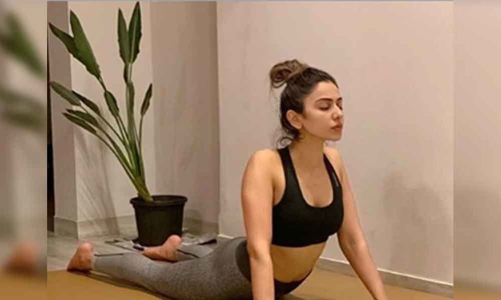 Rakul IMPRESSES Us with her Mighty Sultry Yoga Pose- A Day To Start with!