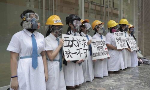 Hong Kong students, workers strike as commutes disrupted