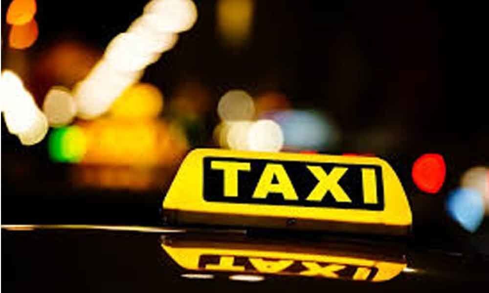 Cab driver escapes unhurt after fire broke out in his vehicle