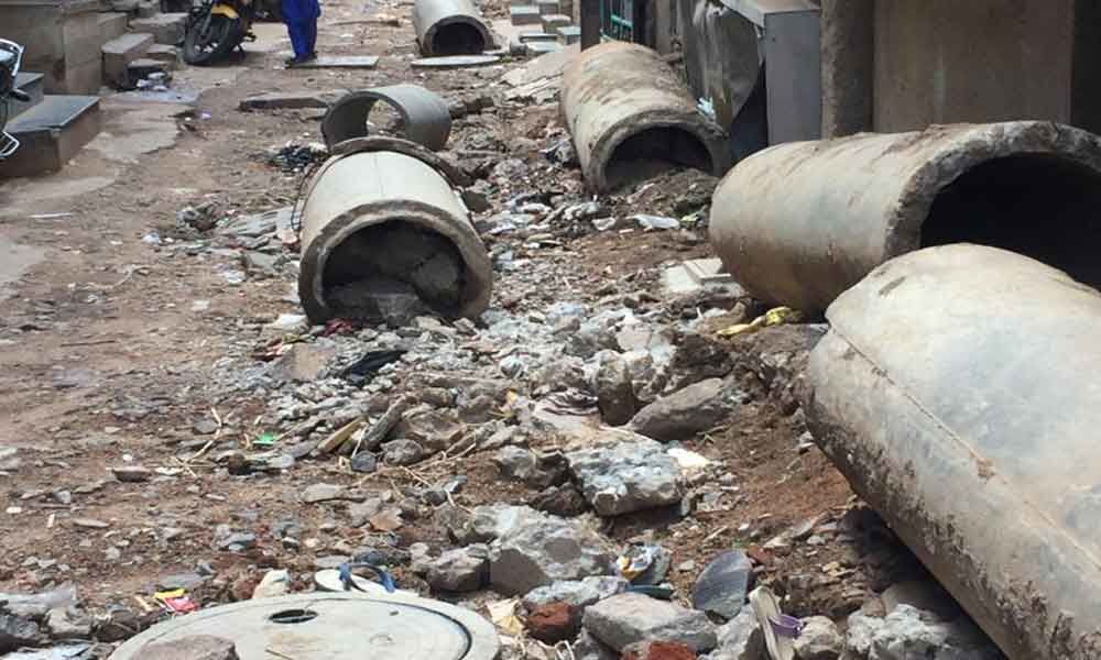 People suffer as sewage pipe-laying drags on