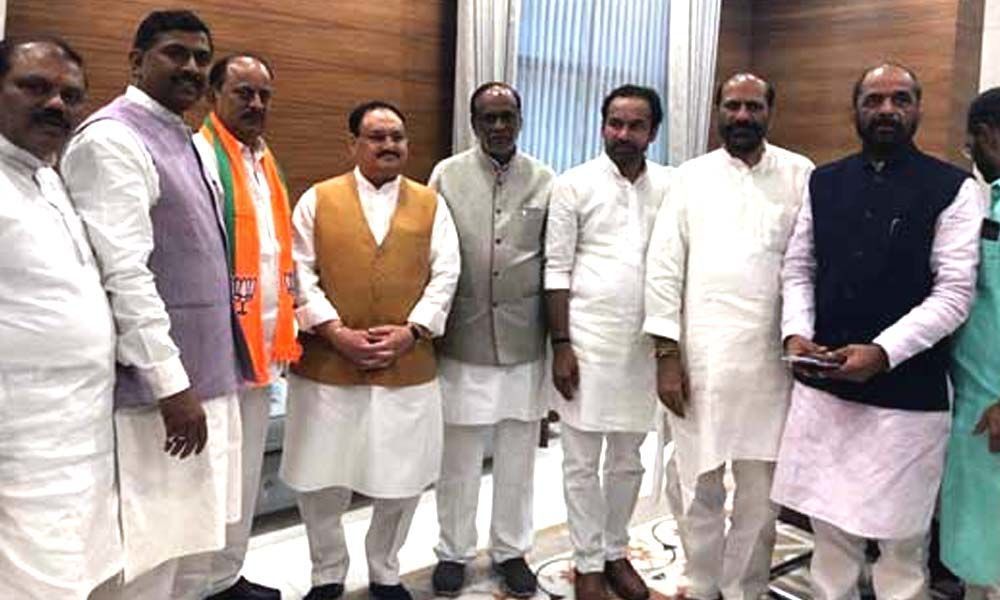 Telangana: Revuri Prakash Reddy, Ravindra Naik join BJP