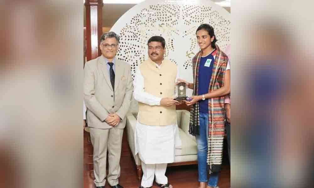 Union Minister fetes world badminton champion P V Sindhu