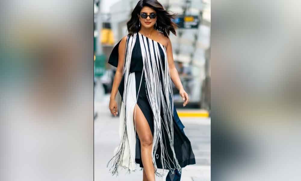 Priyanka Chopra Jonas outfit make heads turn on NYC roads,  that thigh high cuts are not only for celebrity lane