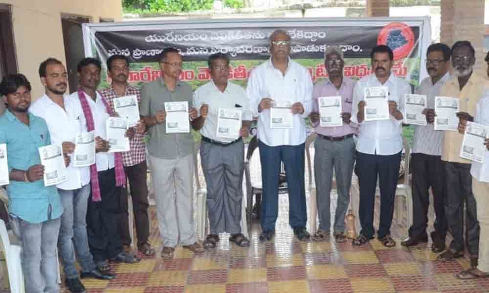 Telangana Vidyavanthula Vedika releases booklets publicising ill-effects of Uranium mining in Nalgonda