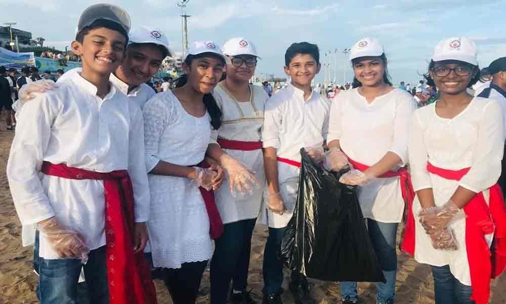 NCS students enact street-play on beach clean-up drive in Vizag