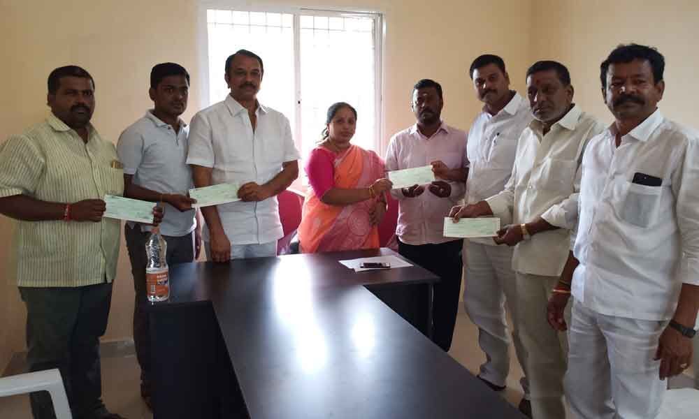 Bonalu cheques gifted to temple committees in Nagole division