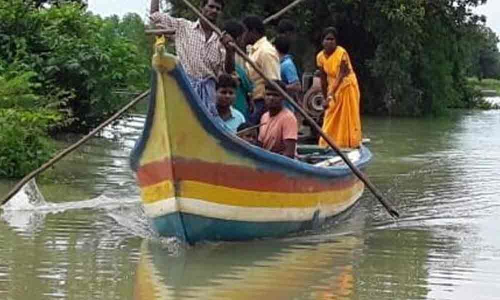 Pregnant woman ferried to Venkatapuram on a country boat