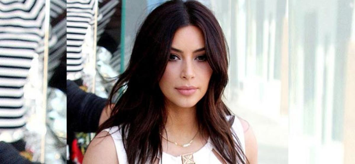 Kim Kardashian flaunts new hair cut