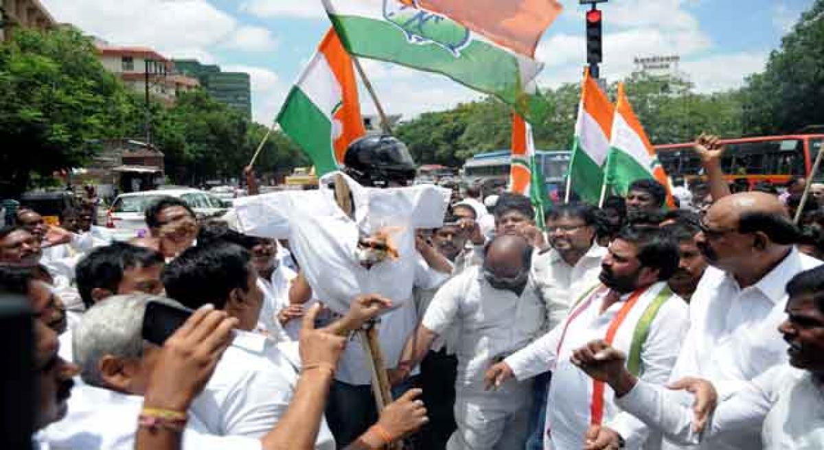 Hikes stoke protests by Congress, YSRCP