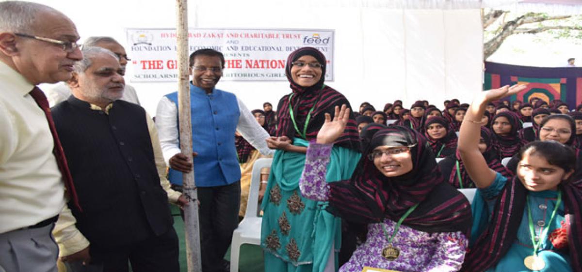 Felicitating meritorious SSC children