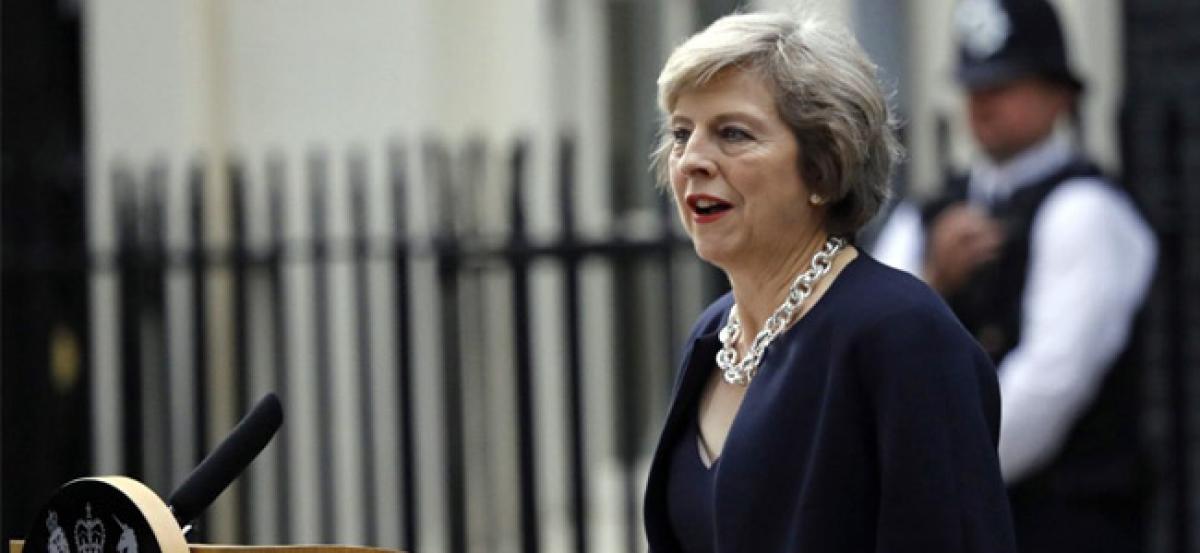 Facing criticism, British PM to visit London fire victims