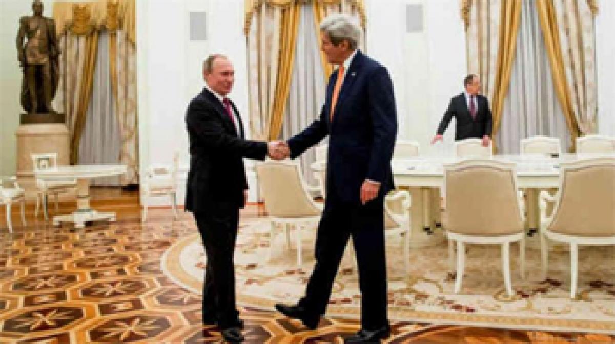 Whats in your briefcase? Putin ribs Kerry ahead of Syria talks