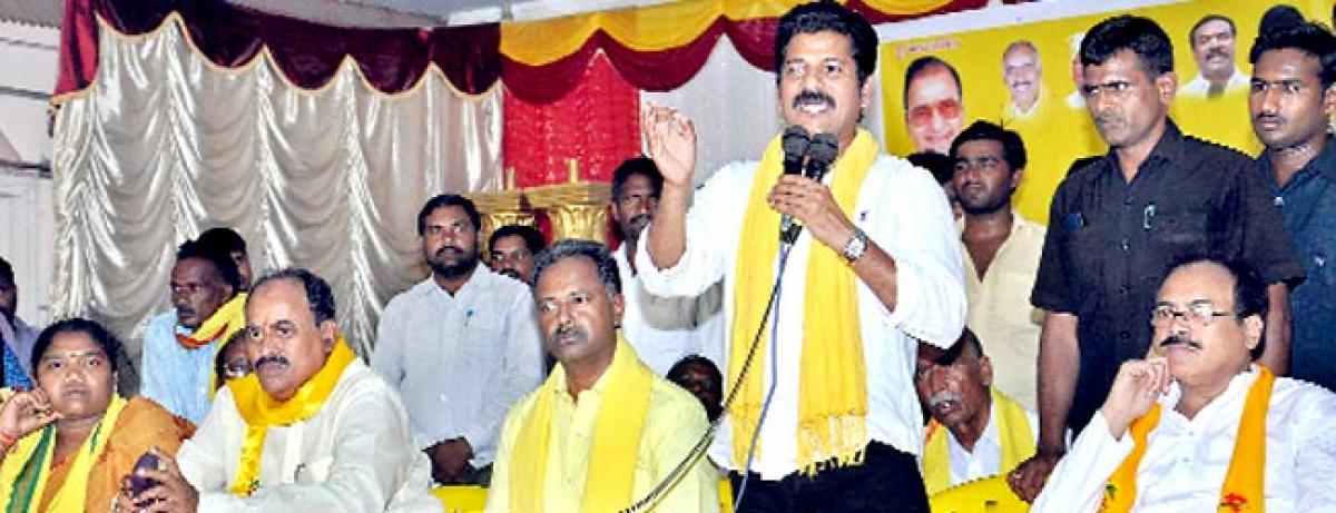 TRS threatening TDP workers with police cases: Revanth