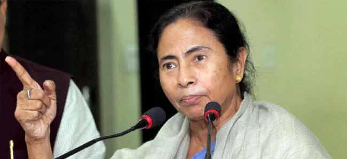 Remove all restrictions on cash withdrawal immediately: Mamata to Centre