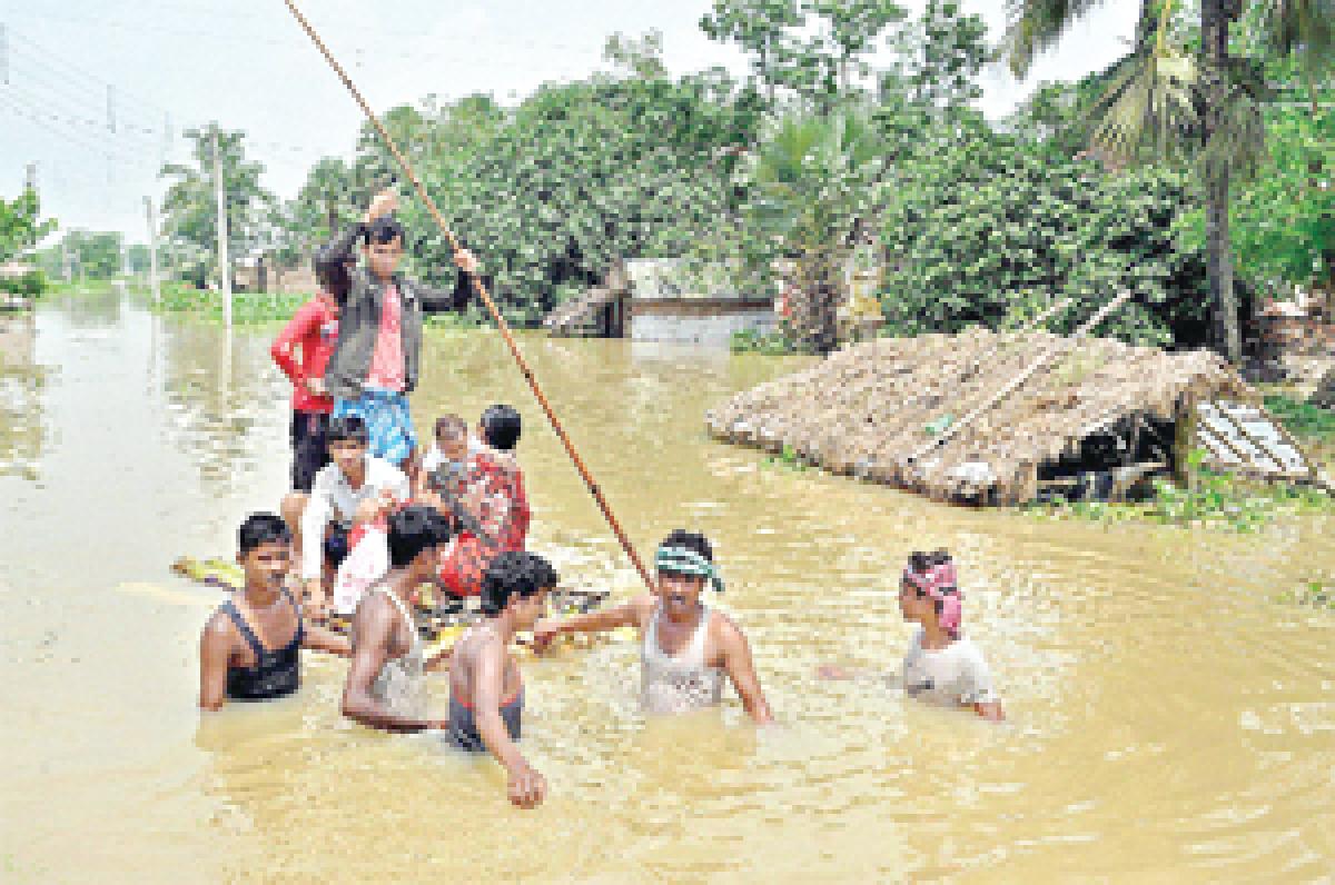 Mamata declares 12 districts as flood-hit