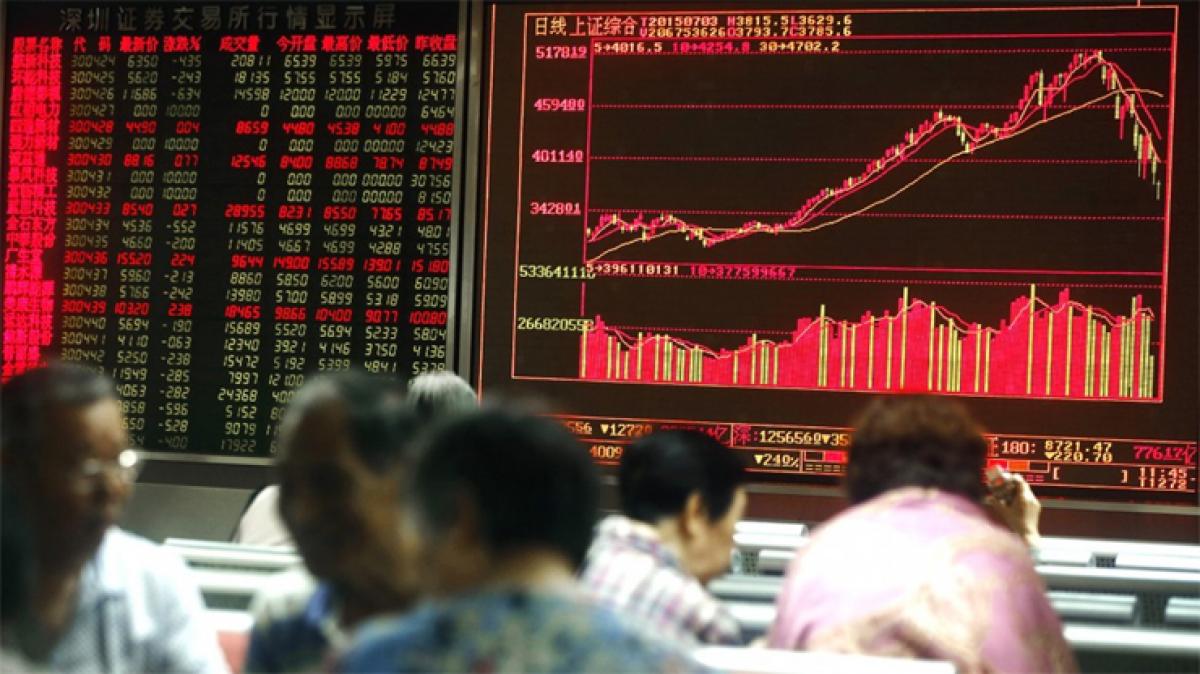 Chinese shares open lower