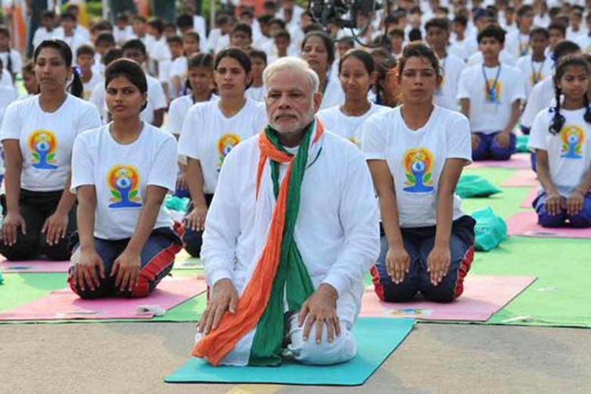 Sisodias jibe at Modi: Yoga not about doing PT exercises