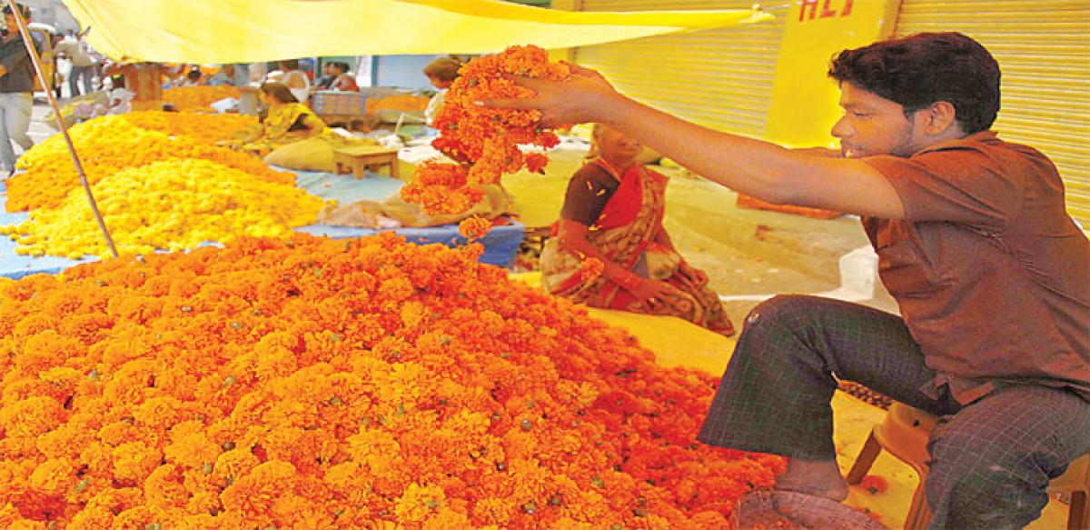 Imported flowers to deck up Bathukamma