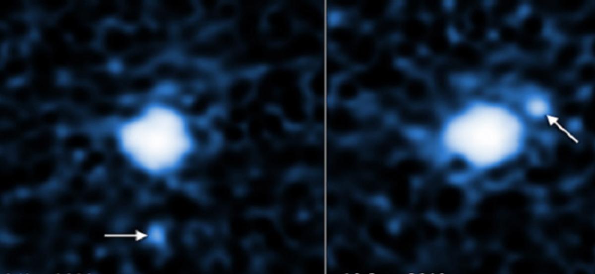 Moon orbiting solar systems 3rd largest dwarf planet found