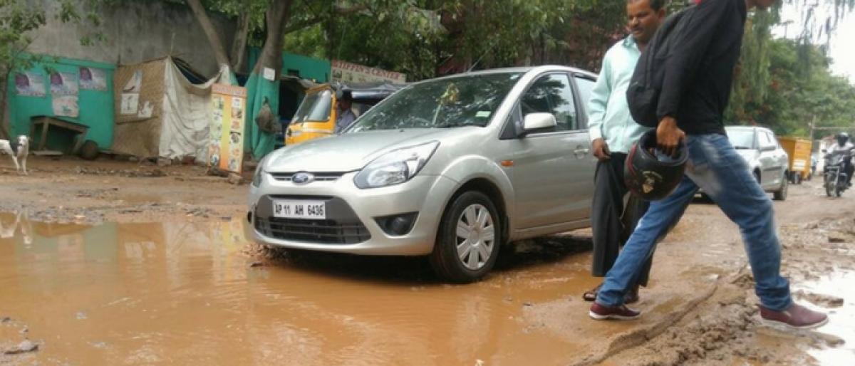 Potholes give nightmare to commuters