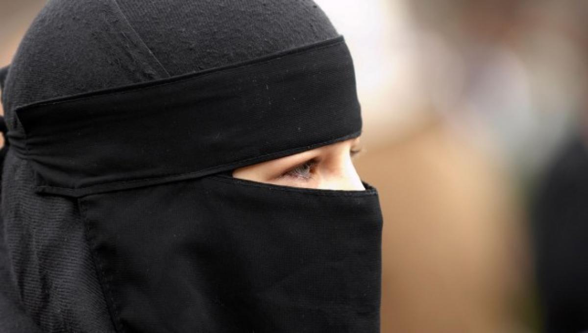 Latvia bans wearing full face veils in public