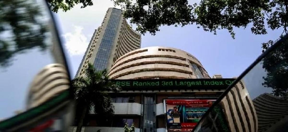 Global cues, profit booking drag equity markets lower