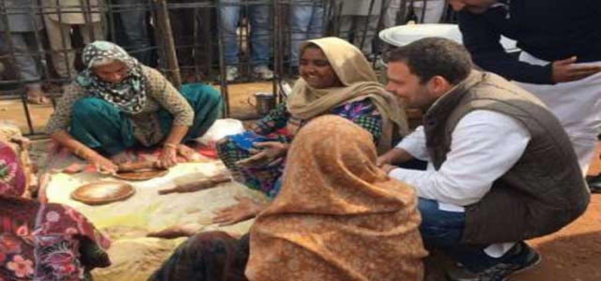 Rahul shares food with villagers