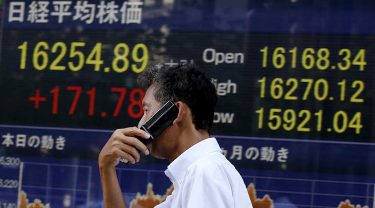 Asia shares lag Wall Street gains, dollar becalmed