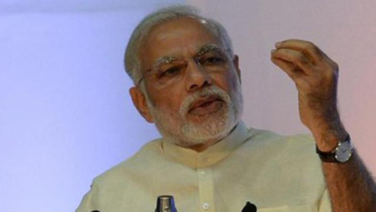 PM Modi urges for mobile banking to deal with Cash crunch problems