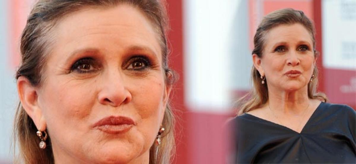 Carrie Fisher ‘out of emergency room’