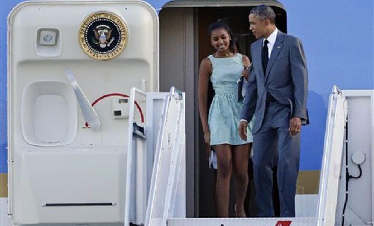 Dad-in-Chief Barack Obama takes daughters for night out in Air Force One