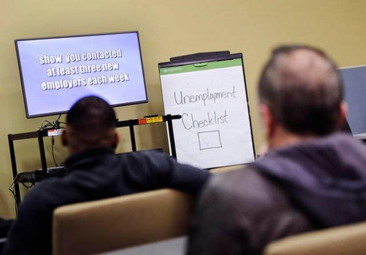 US unemployment claims fall to 12-week low