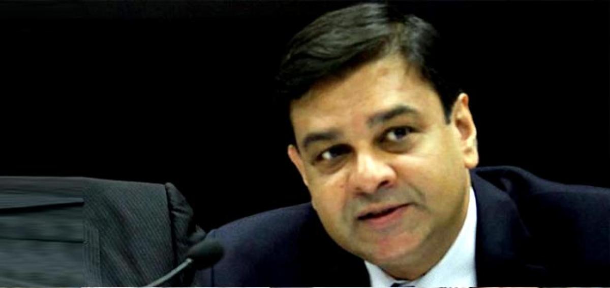 New RBI chief and panel face close call on rates