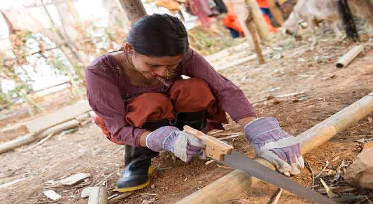 Young Nepali girl rebuilds shattered community