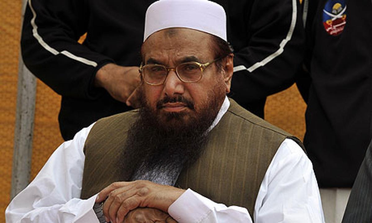 Action against Hafiz Saeed first step in bringing him to justice: MEA