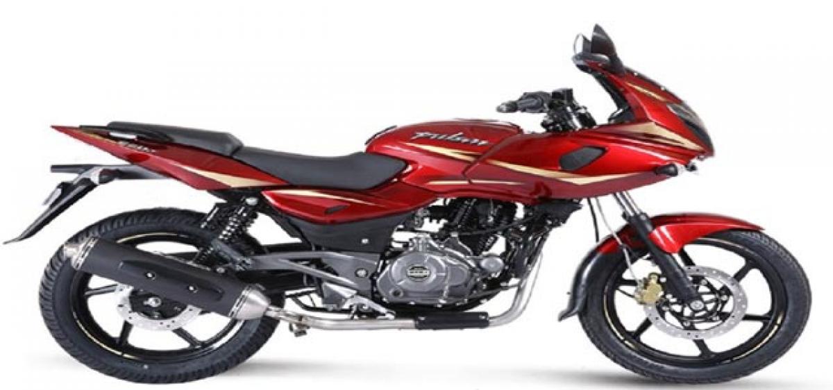 Pulsar 220 red colour gets golden graphics
