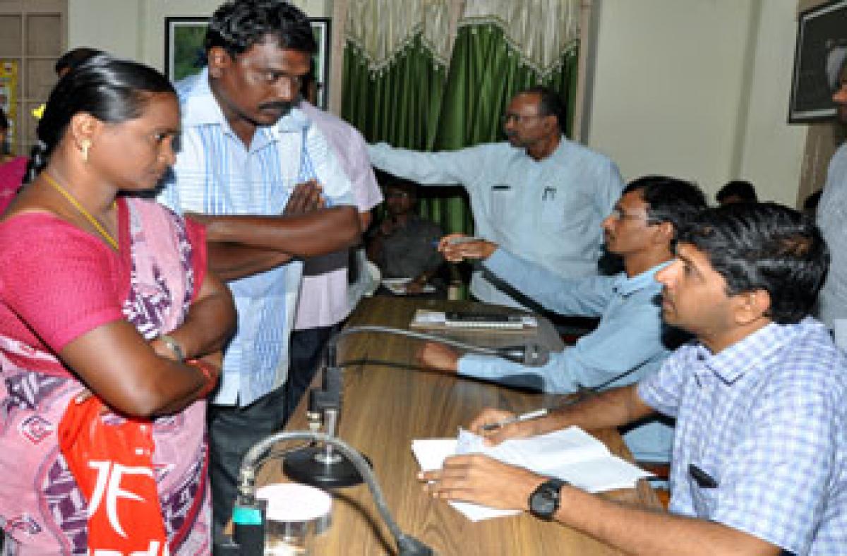 Salary not paid, workers petition Collector