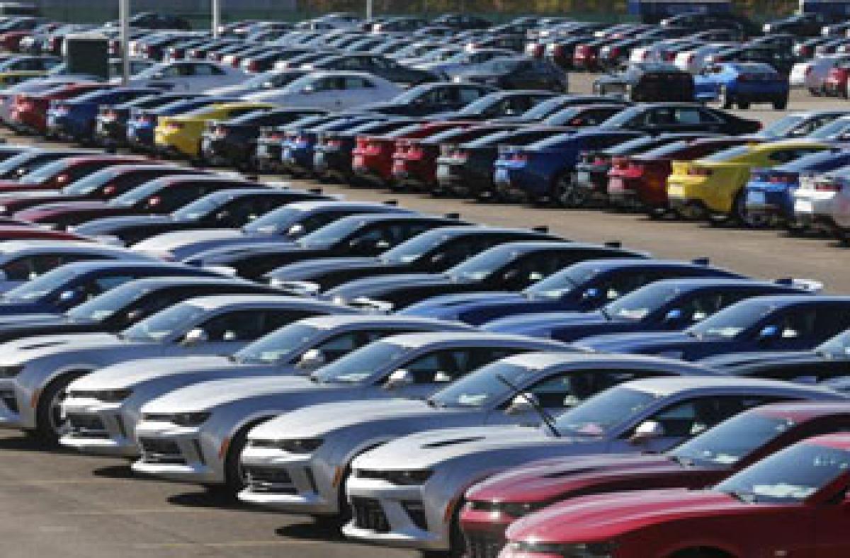 Automakers post robust sales in December
