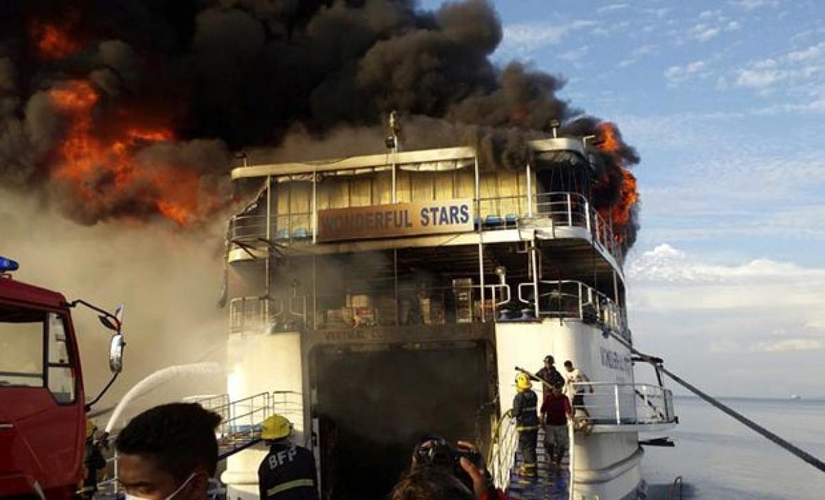 Fire engulfs Philippine ship with 544; passengers jump off into the sea