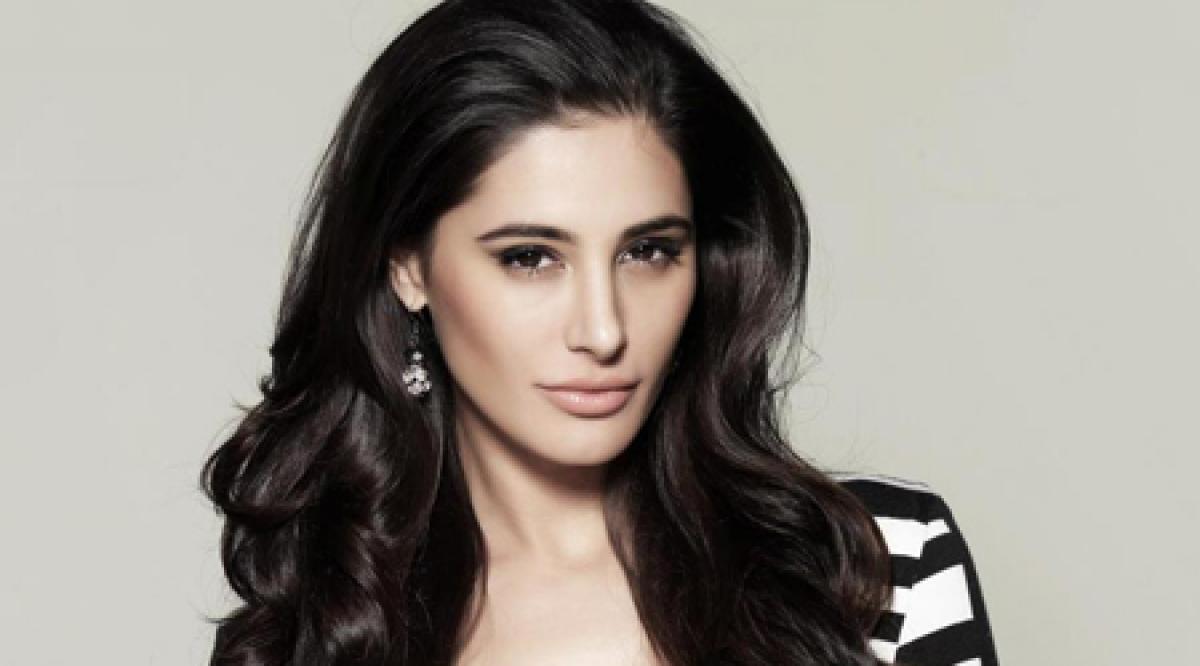 Nargis Fakhri conned off Rs 6 lakh in credit card fraud