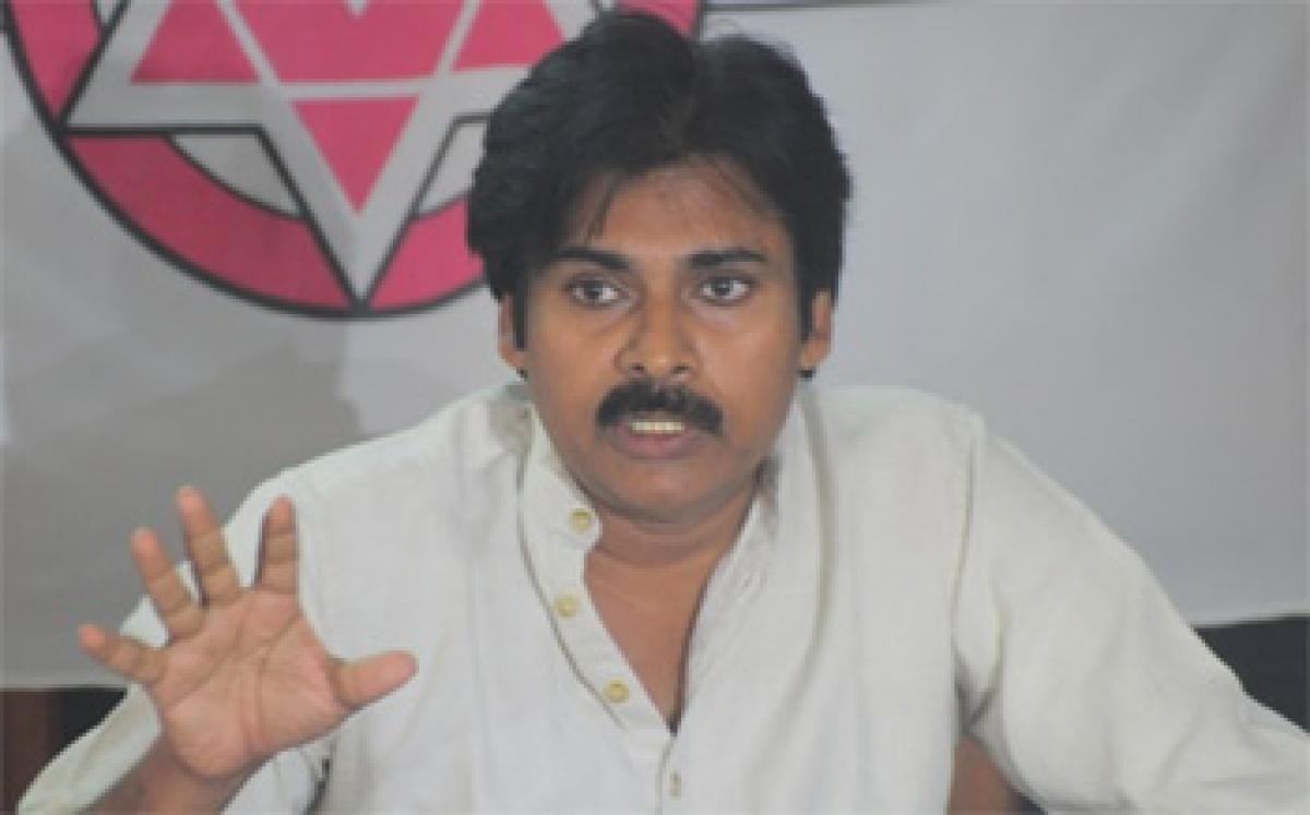 Kapu leaders tear Pawan Kalyan flexis in Bheemavaram, Narsapuram