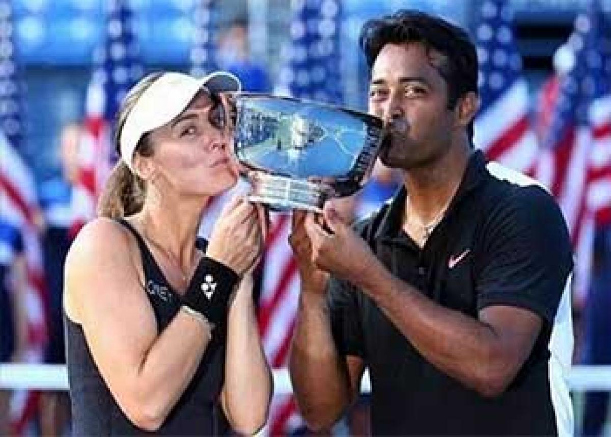 Paes-Hingis break 46-year jinx