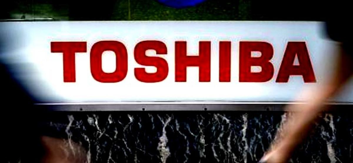 Toshiba shares tumble as bigger stake in chip unit likely up for sale