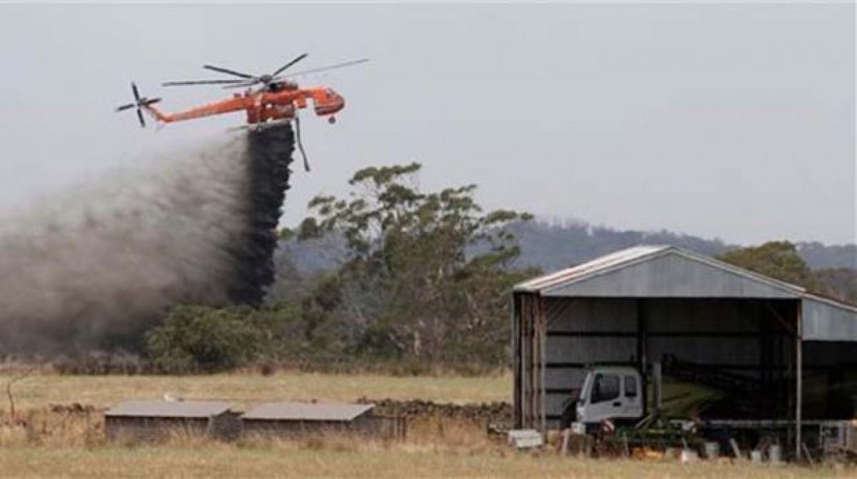 Christmas wildfire claims more than 100 homes in Australia