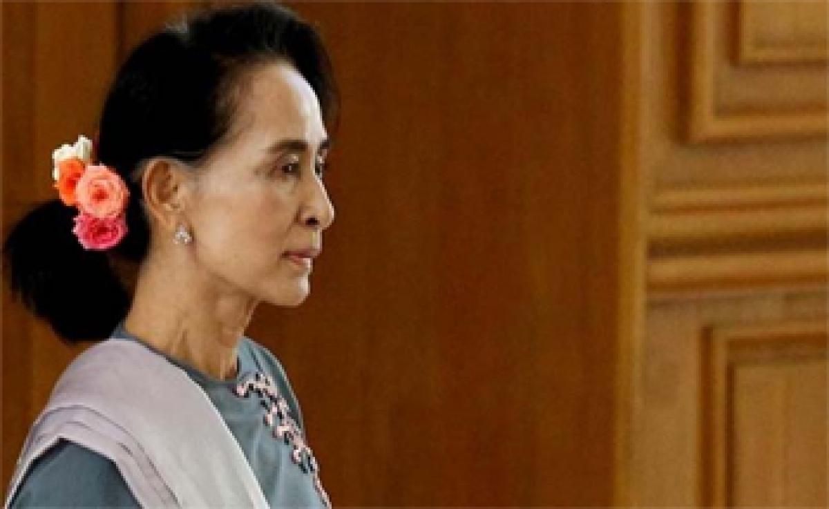 Myanmar court frees student activists after Suu Kyi pledge