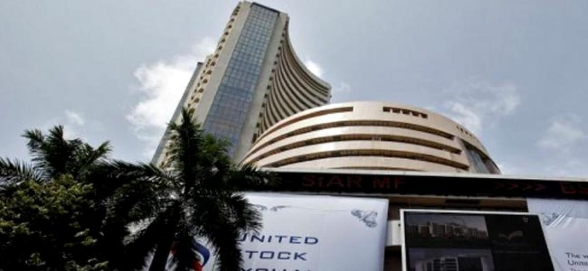 Bulls ride on election outcome, Nifty closes above 9,100-mark