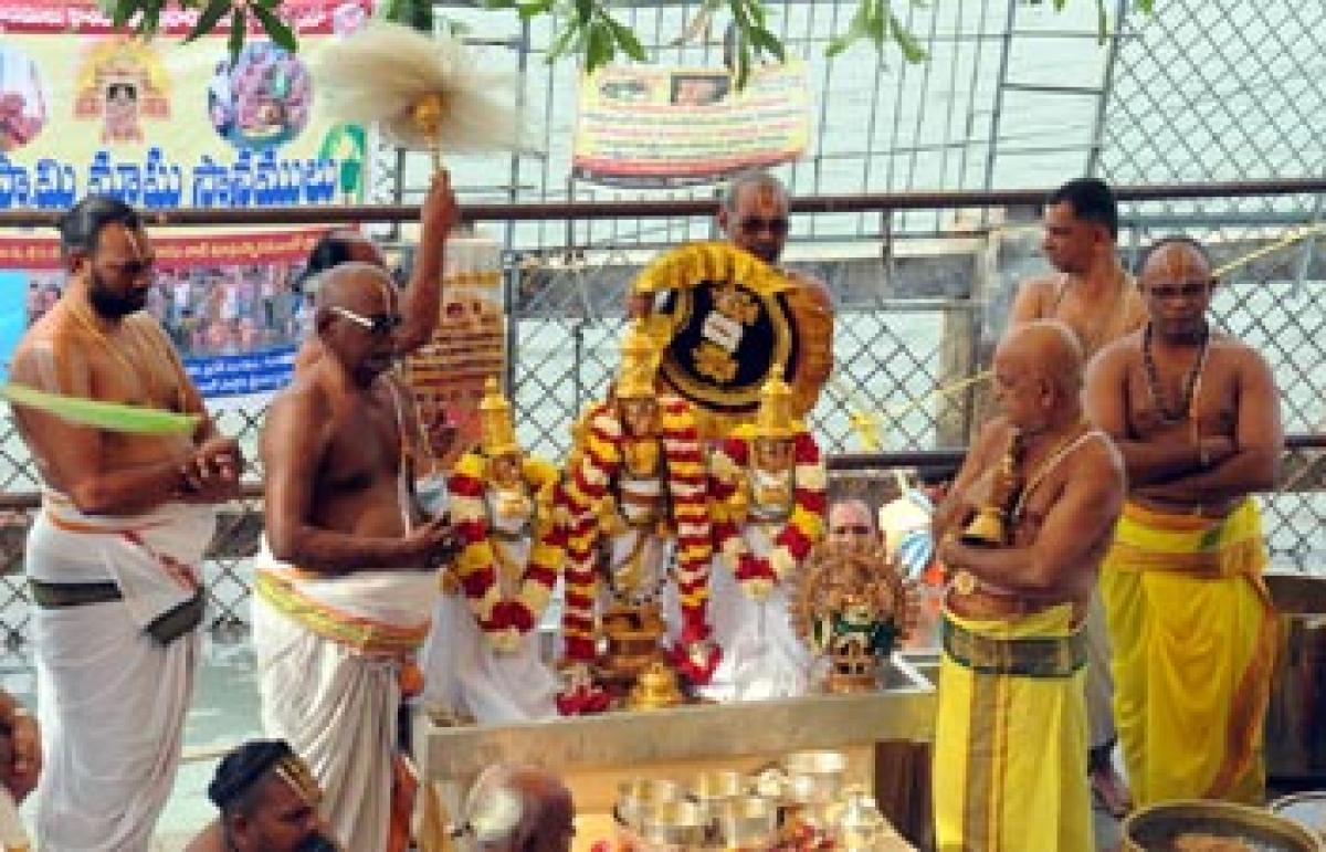 TTD priests perform Chakrasnanam at Durga Ghat