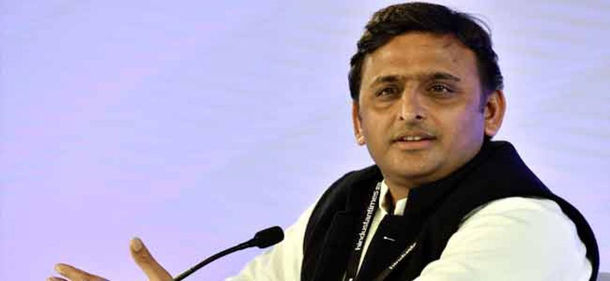 Akhilesh launches campaign with tainted Prajapati by his side