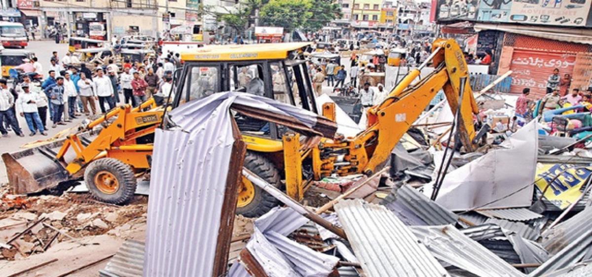 GHMC pulls down 26 illegal buildings